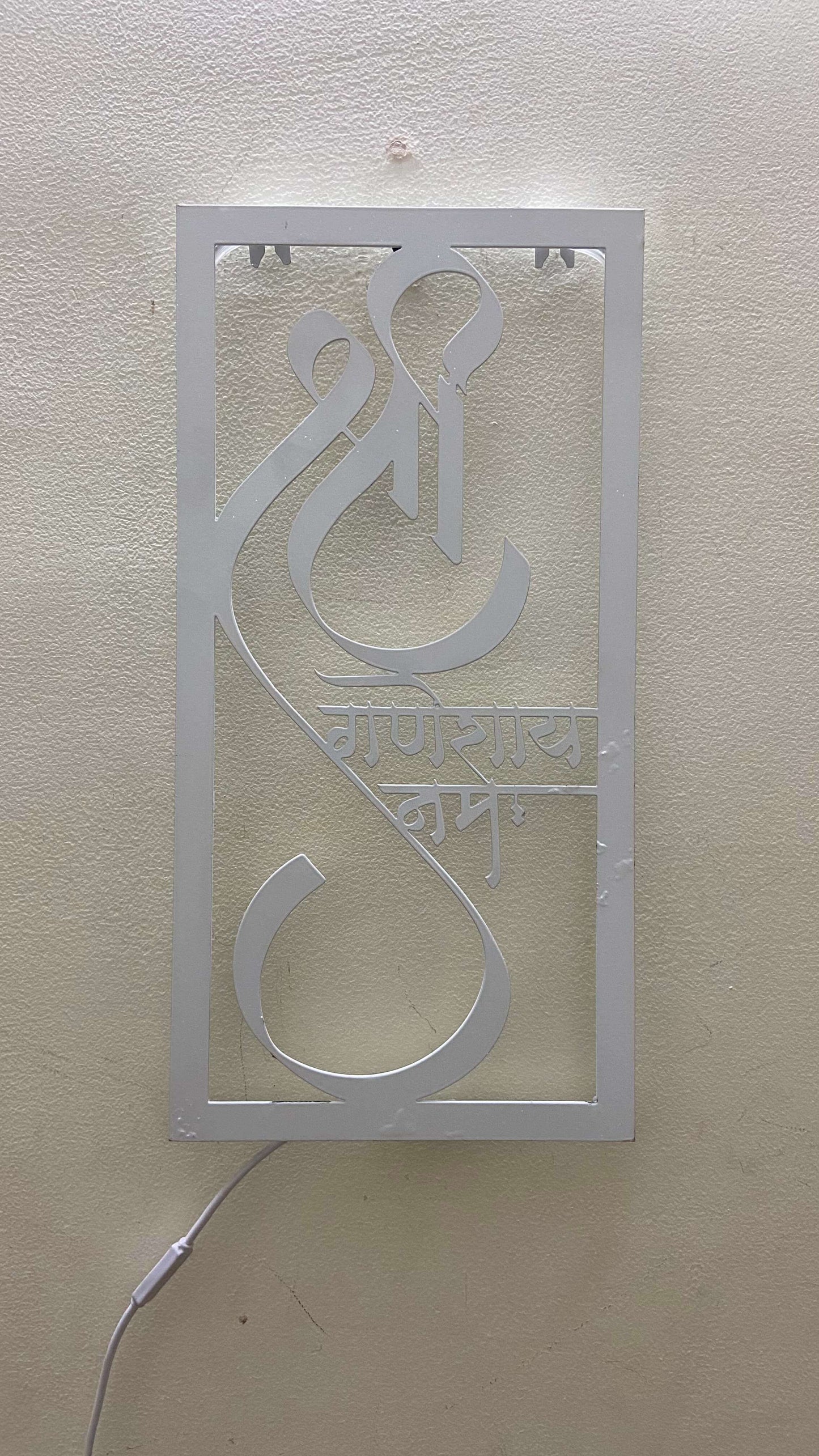 Shree Ganeshay Namah Mantra Metal Wall Art Frame With LED Light – White & Black Variants